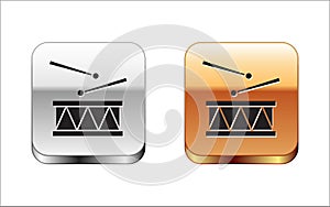 Black Drum with drum sticks icon isolated on white background. Music sign. Musical instrument symbol. Silver and gold