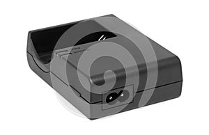 Black dslr camera battery charger isolated on white background