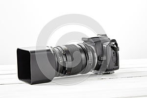 BLACK DSLR Camera with tele lens