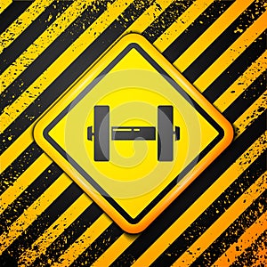 Black Dumbbell icon isolated on yellow background. Muscle lifting icon, fitness barbell, gym, sports equipment, exercise