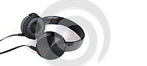 Black dynamic stereophonic headphones studio photo  isolated on white closeup