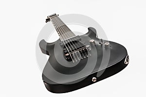 Black electric bass guitar isolated on white