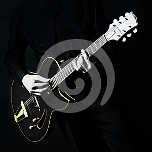 Black electric guitar