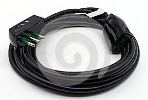 Black electric power extension cable isolated on a white background.