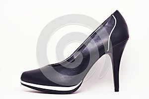 Black elegant high-heeled shoe.