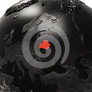 Black Embossed Earth Globe with Europe Close-Up. The Republic of Belarus is Highlighted in Red in The Center.