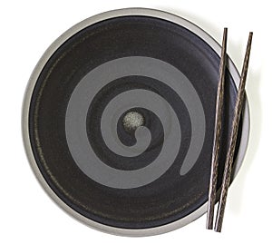 Black Empty Plate with wooden Black chopsticks On White Background