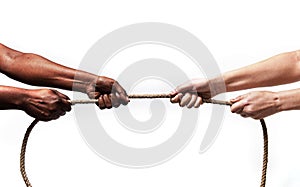 Black ethnicity arms with hands pulling rope against white Caucasian race person in stop racism and xenophobia concept