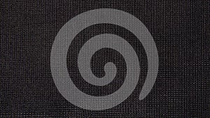Black fabric texture in a small square cell.
