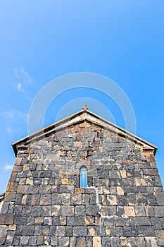 black facade of S Arakelots church in Sevanavank