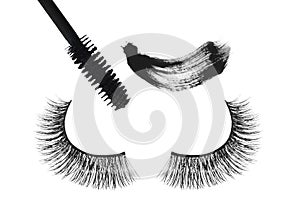 Black false eyelash and mascara isolated on white