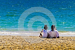 Black family and azure sea photo