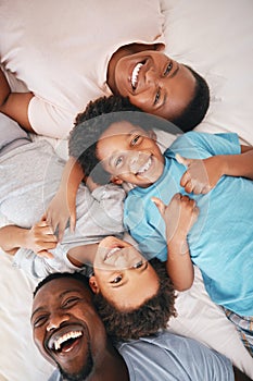 Black family, bed portrait and top view with smile, happiness and kids with thumbs up with dad, mom and love. Happy