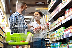 Black Family Couple Shopping Groceries In Supermarket Buying Food