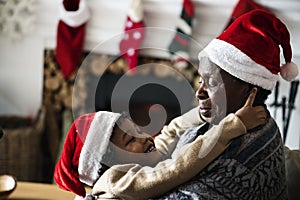 Black family enjoying Christmas holiday