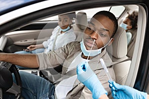 Black Family Getting Tested For Coronavirus In Car, Wearing Masks