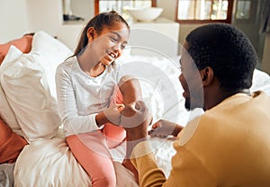 Black family, girl and father fist bump for love, bonding or care in bedroom. Hands gesture, unity and happy kid and man