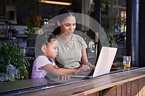 Black family, internet cafe or laptop with a mother and daughter together in the window of a restaurant. Kids, computer