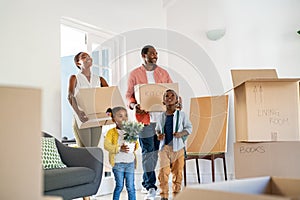 Black family with two children moving house