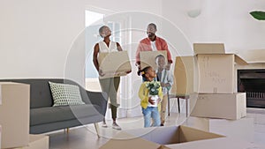 Black family with two children moving house