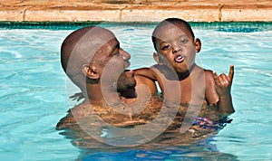 Black father son swim