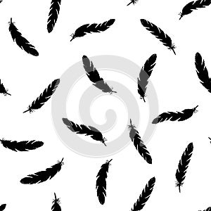 Black feathers seamless pattern on white background.