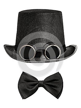 Black felt hat with canned glasses and bow tie isolated on white