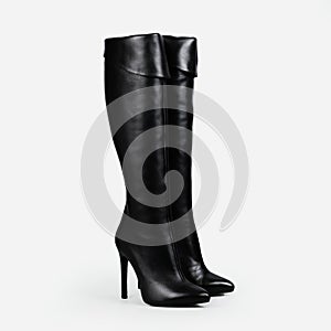 Black female boot on white