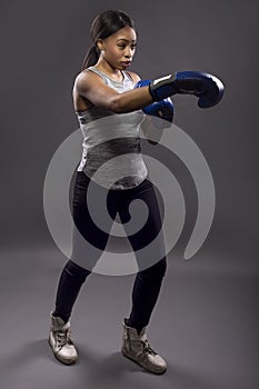 Black Female Boxer or MMA Training
