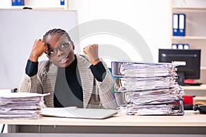 The black female employee unhappy with excessive work