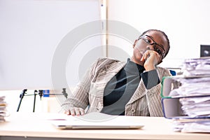 The black female employee unhappy with excessive work photo