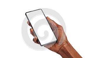 Black female hand holding smart phone with empty screen