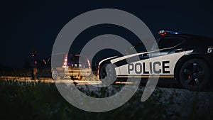 Black Female Police Officer Stepping Out of Patrol Car and Heading Towards a Pulled over Car. Cop