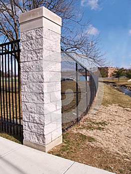 Black fence and cornerstone