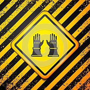 Black Firefighter gloves icon isolated on yellow background. Protect gloves icon. Warning sign. Vector