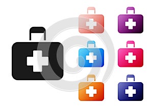 Black First aid kit icon isolated on white background. Medical box with cross. Medical equipment for emergency