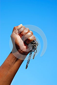 Black fist with chain