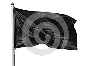 Black flag waving in the wind on flagpole, isolated on white background