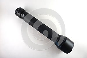 Black Flashlight against a White Background