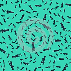 Black Flashlight icon isolated seamless pattern on green background. Vector