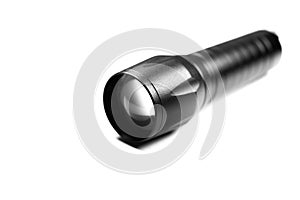 Black Flashlight on the white background. Close up