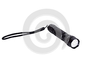Black flashlight on white background.