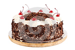 Black forest cake decorated with whipped cream and cherries