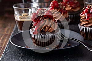 Black forest cupcake with whipped ganache and cherry topping