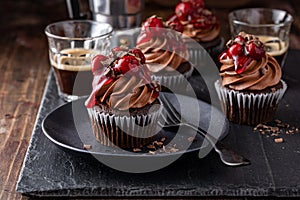 Black forest cupcake with whipped ganache and cherry topping