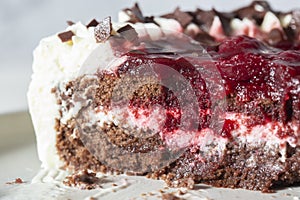 Black forest gateaux dessert on a grey stoneware plate