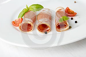 Black forest ham on white plate