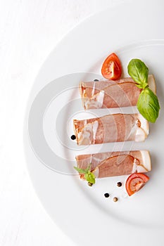Black forest ham on white plate