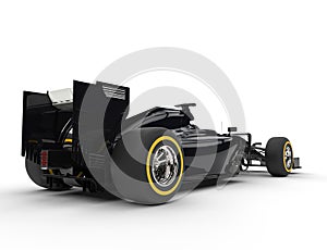 Black formula one car - tail view