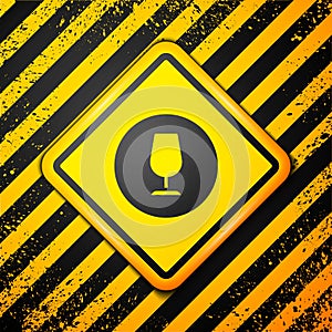 Black Fragile broken glass symbol for delivery boxes icon isolated on yellow background. Warning sign. Vector